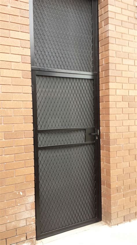 Steel Security Door Enclosure With One Way Vision Mesh Installed In