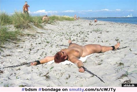Naked Women Staked Out On Beach Sexiz Pix