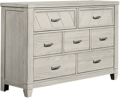 These variations highlight the unique characteristics of each individual piece and… Rustic Cottage Rustic White 7 Drawer Dresser from Vaughn ...
