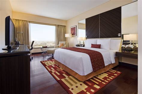 Minimalism is a strict norm in this room and there is no place for unnecessary elements. Courtyard Mumbai International Airport Executive Club ...