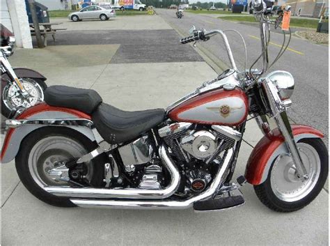 Should fit most full size windshields. 1999 Harley-Davidson FLSTF Fat Boy for sale on 2040-motos
