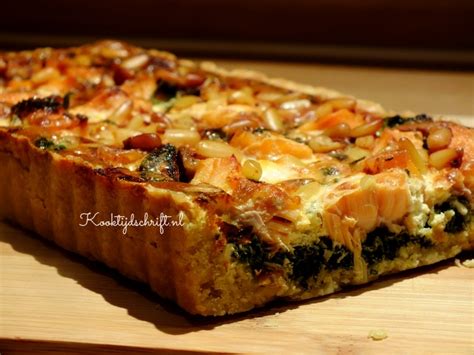 Hartige taart met zalm en spinazie