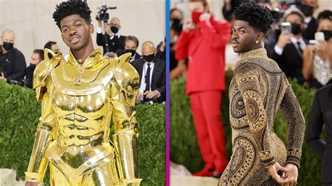Met Gala 2021 Lil Nas X BUSTS OUT Of Gold Armor Into Glittery Bodysuit