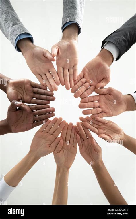 Close Up Of Diverse People Join Hands In Circle Stock Photo Alamy