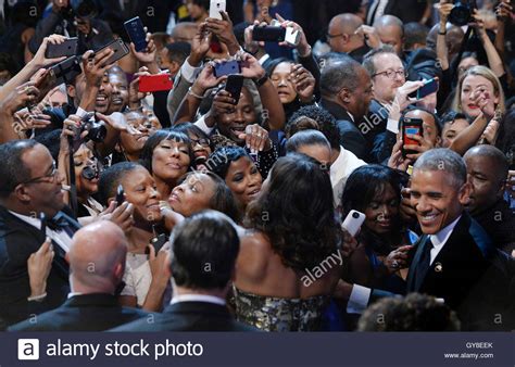 United States President Barack Obama And First Lady Michelle Obama Greet Guests At The
