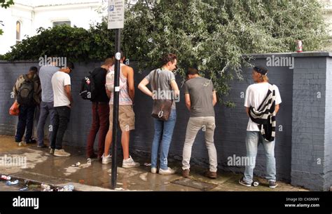 Men Urinating In Public In The Street London Stock Photo Alamy