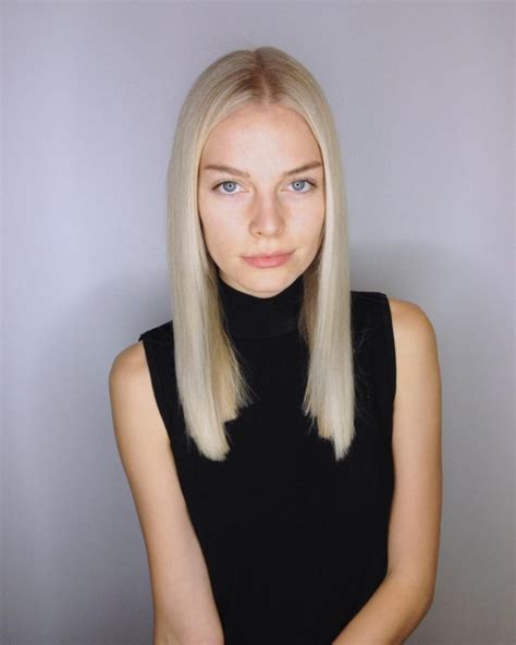 How do you cut a blunt cut at home? Sleek Blunt Cut with Center Part and Subtle Platinum ...