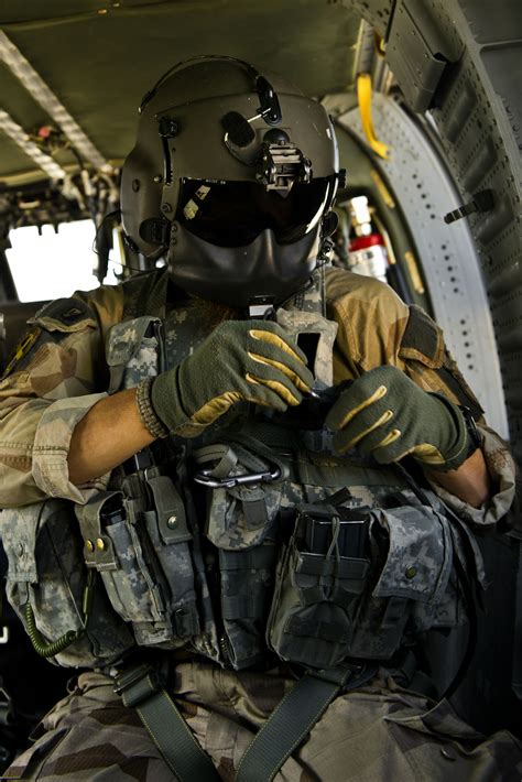 Door Gunner Mask And A Swedish Uh 60m Door Gunner Pictured During A