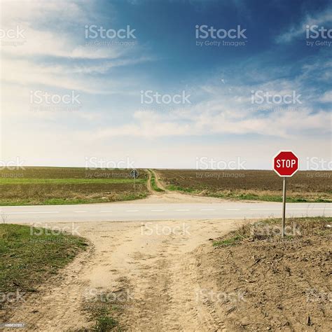 Crossroad With Warning Sign For Priority Road Stock Photo - Download ...