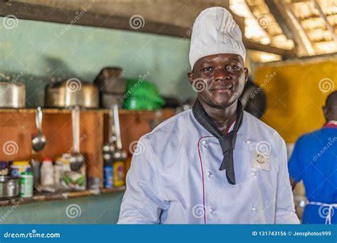 Portrait Of Young Black Male African Chef Cooking In The Restaurant
