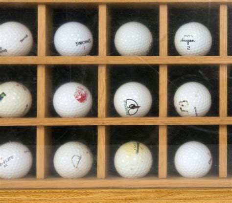Wooden Display Case With Golfball Collection Ebth