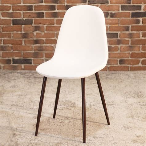 A round, open back helps create a lovely silhouette for these side chairs, which are finished in beige/off white to maintain a fresh look. MILAN-Eames Style White Leather Dining Chair with Faux ...
