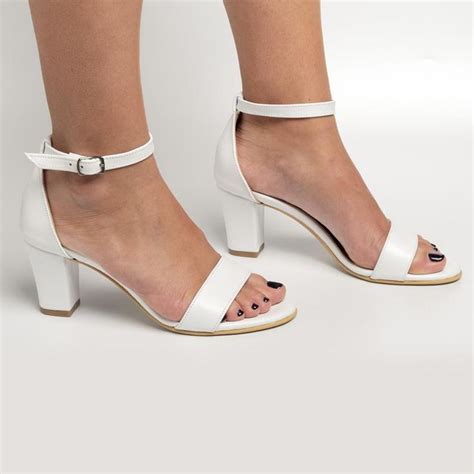 White leather shoes are definitely having a moment, but they're also susceptible to dirt and grime. Block heel white leather, White low heels, Wedding sandals ...