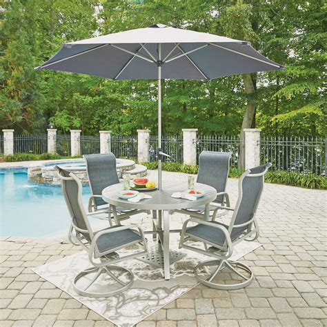South Beach 7 Pc. Round Outdoor Dining Table & 4 Swivel Rocking Chairs ...
