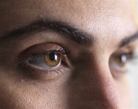 Close Up Of Woman With Hazel Eyes Stock Photo