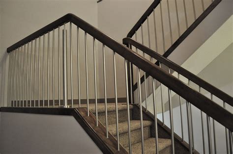 Metal railing is usually used in public facilities with concrete staircases. Iron Stair Railing Ideas John Robinson Decor Railings ...