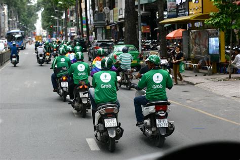 To take or grasp suddenly: Vietnam to reinvestigate Grab-Uber deal