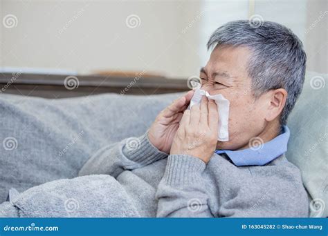 Asian Elderly Sick Man Sneeze Stock Photo Image Of Chinese Paper