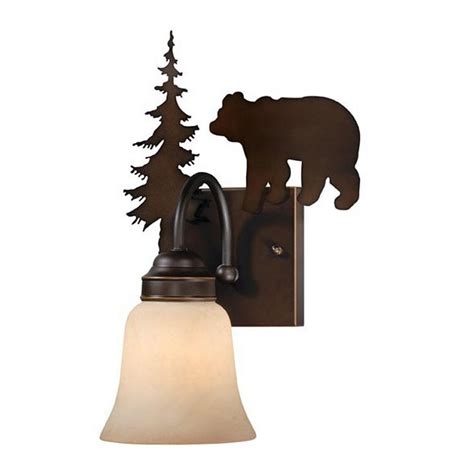 The pom poms are individual pieces of metal laboriously fitt. Bozeman Bear Single Wall Sconce