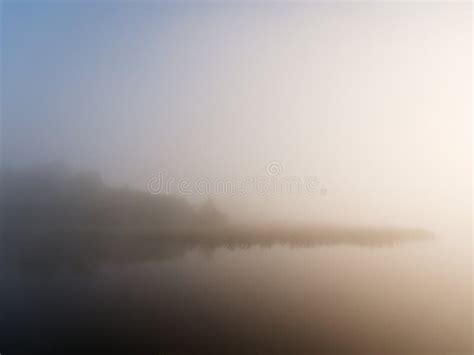 Foggy Morning On The River Near The Floodplain Meadow Stock Photo