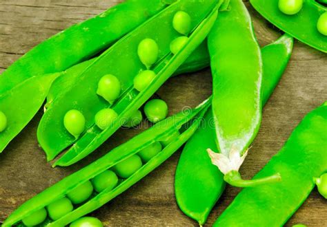 Fresh Green Peas On Wood Background Peas Pods And Leaves Set Healthy
