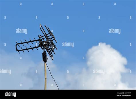 Indonesian Local Tv Antenna With Blue Sky Background Stock Photo Alamy