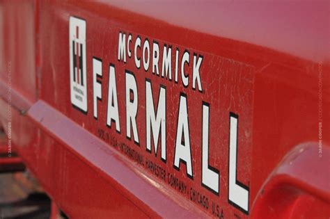 Photo Of Red Mccormick Farmall Tractor Logo On The Side Of The Tractor