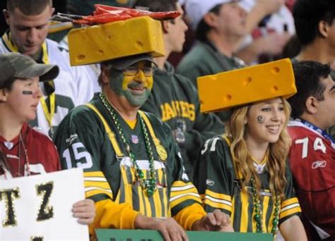 A Couple Of Cheeseheads In Their Unique Packers Fan Outfits Packers Fan Reality Tv Shows