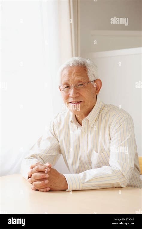 Senior Adult Japanese Man Sitting Stock Photo Alamy