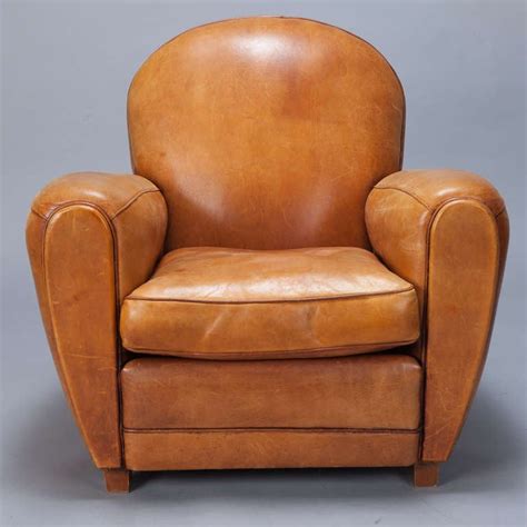 The armless design and plywood frame keep it clean. Pair of Art Deco Caramel Colored Leather Club Chairs at ...