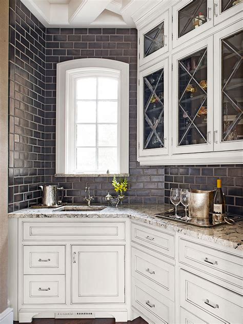 Another option can be subway tile with black grout. Black Subway Tile Backsplash - Transitional - kitchen - BHG
