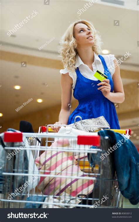 App developed by wish inc. Photo Of Young Joyful Woman With Shopping Bags Inside Mall ...
