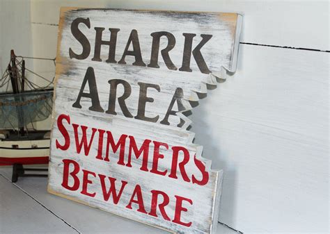 It's your own personal haven—a place where you can retreat and be yourself. Shark bite sign, nautical nursery, beach decor, surf ...