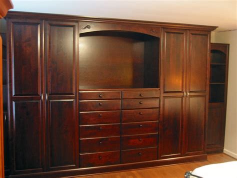 A sideboard, a wardrobe and some shelves. Wall Units & Wardrobes - Traditional - Closet - cleveland ...