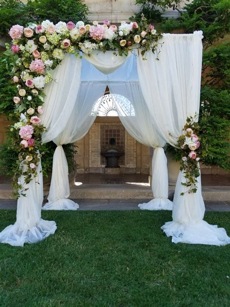 Blushpinkrose And Ivory Floral Decor On This Wedding Chuppah Arch In