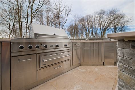 Hestan's outdoor storage includes drawers and pantries that keep your ingredients close at hand and safe from the elements (or animals), while trash chutes and recycle centers keep it neat. Stainless Steel Outdoor Kitchen Cabinets | SteelKitchen