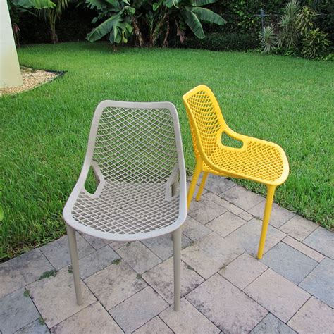Such a design is often called a conversation piece because it elicits heated debate. Compamia : Air Outdoor Dining Chair Tropical Green ISP014-TRG