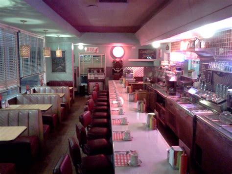 Vintage diner by nikolyn mcdonald. (Open Rp) I slid into the seat in the back corner and ...