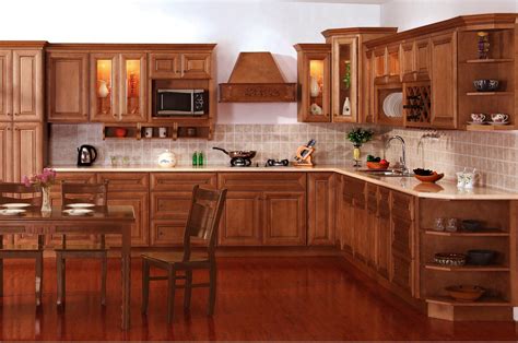 The medium stained wood tones (especially that being said, my wall color selection for cherry stained kitchen cabinets are colors that have a blue undertone, but have some gray to them as to. The Cabinet Spot: Coffee Maple Cabinets