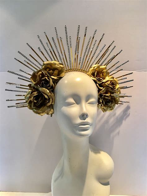 This crown adds shine with a burst of sun to a costume or outfit, with a modern twist on iconic imagery! Gold spike headband -Crown headpiece | Gold headpiece ...