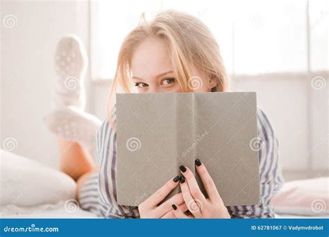 Flirty Shy Young Woman Covered Her Face By The Book Stock Image Image