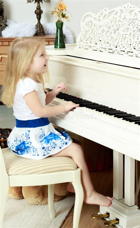 Little Girl Is Playing The Piano Stock Image Image Of Beauty Piano