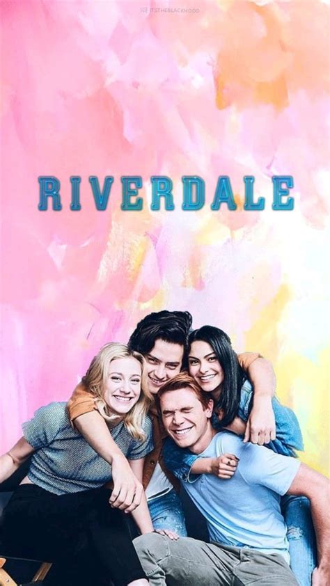 The Cast Of Riverdale Posing For A Photo In Front Of A Colorful