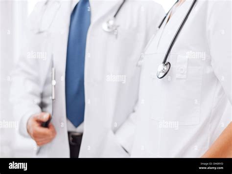 Two Doctors With Stethoscopes Stock Photo Alamy