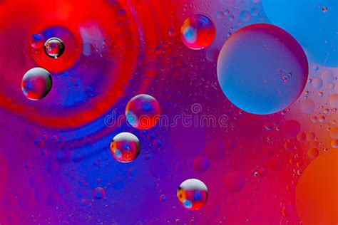 Abstract Space Background Of Oil Drops On The Water Surface Stock Image