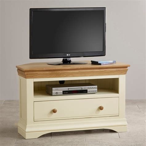 On choicefurnituresuperstore.co.uk £379.00 delivery costs included. Country Cottage Natural Oak Corner TV Cabinet - Cream Painted
