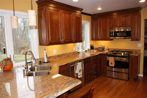 If you're looking for paint colors that contrast with cherry colored cabinets, green is the color choice for you. Image result for what color should i paint my kitchen ...