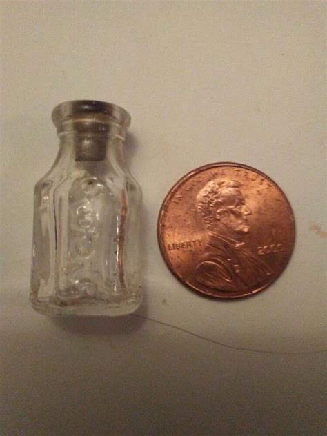 Sorry for the poor pictures, if anyone is interested message me, thanks!. Antique (VERY. TINY) Miniature CLEAR Medicine Bottle inch ...