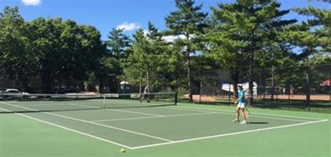 Four lighted gravel tennis courts in delfts hof van delft district (northwest part of city). Oz Park | Chicago Park District