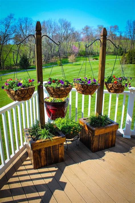 Use pots to define garden spaces. 17 Fascinating Examples How To Arrange Hanging Flowers For ...